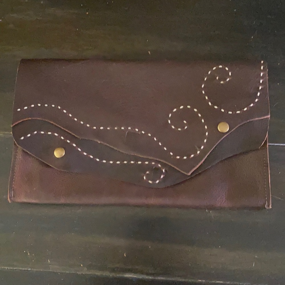 Sundance leather clutch